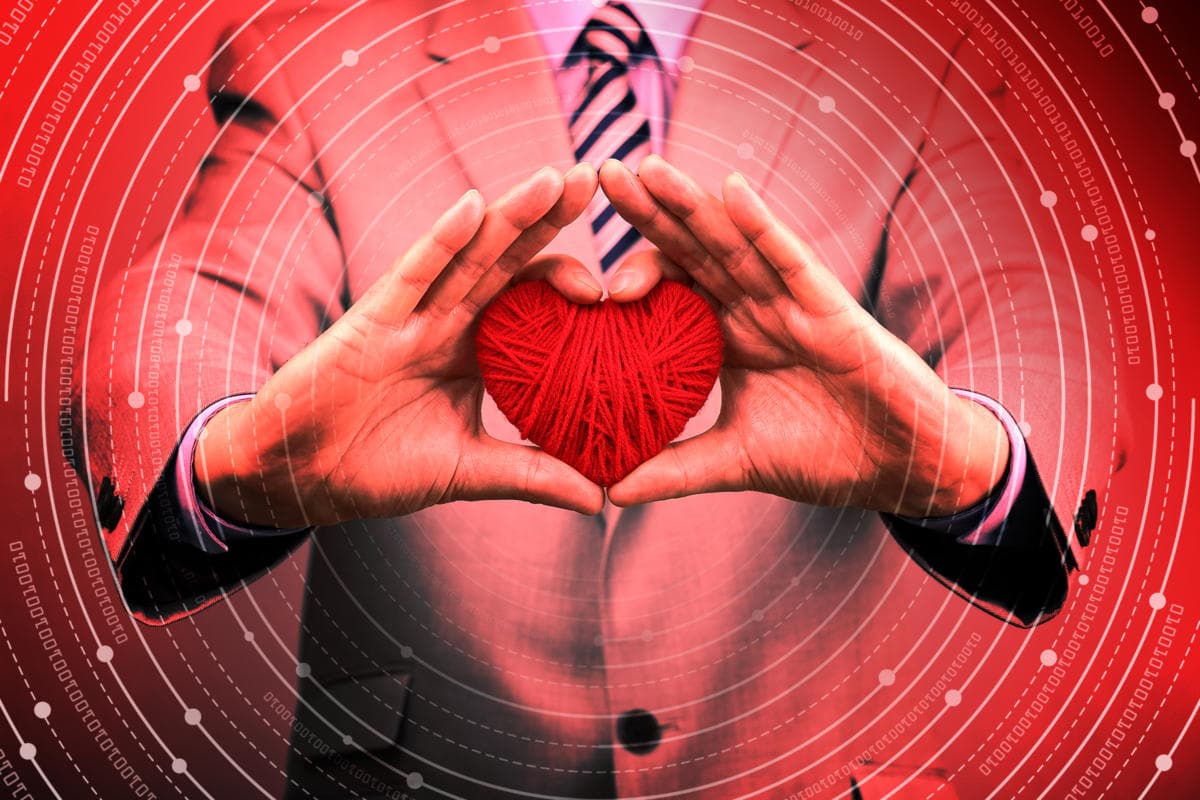 Businessman Holding Red Woolen Heart